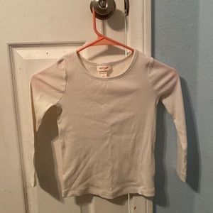 I am selling a white long sleeve t-shirt by cat and jack.